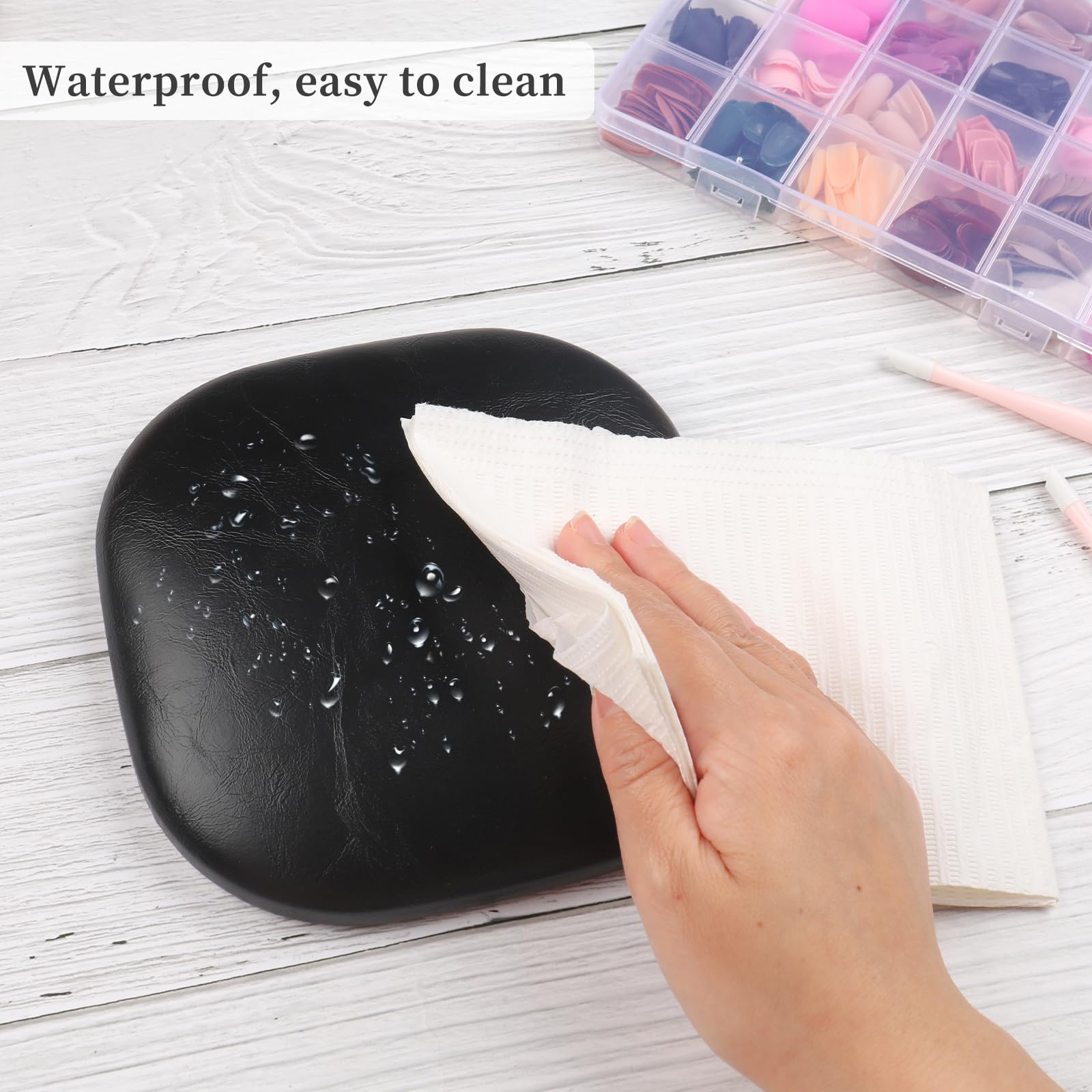 Yingjee black nail hand rest showing non-slip base texture