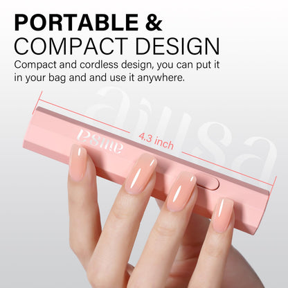 Close up view of the single control button on the pink handheld ultraviolet nail light.