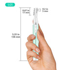 Compact green facial hair trimmer packaging and included cleaning accessories
