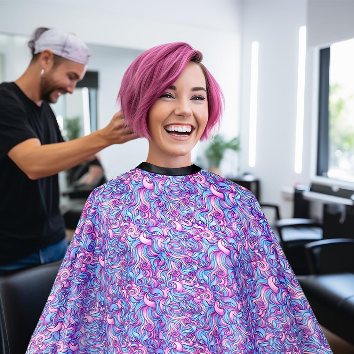 Lightweight antistatic hairdresser cape fabric texture detailing the swirl design