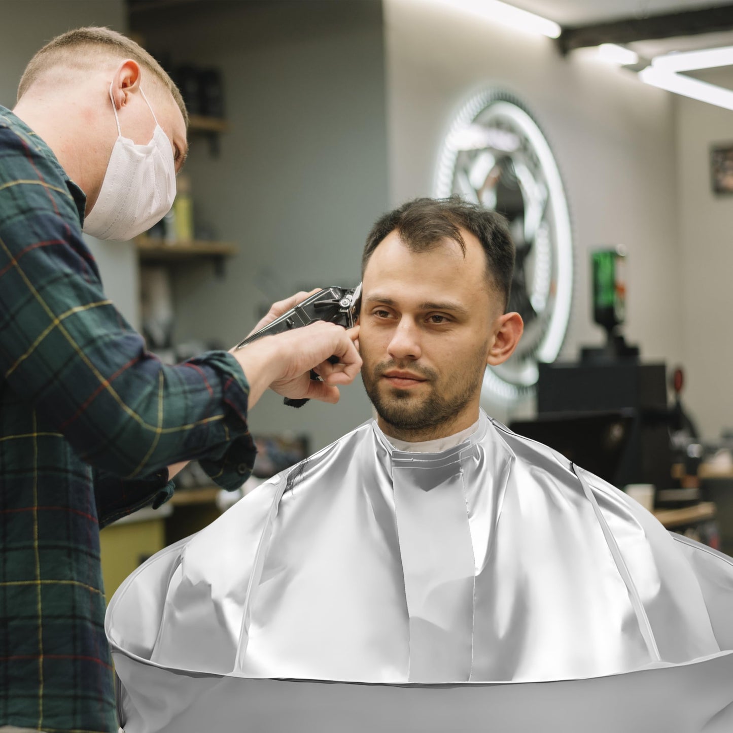 Wsevinn professional grooming cape worn by an adult for home haircutting
