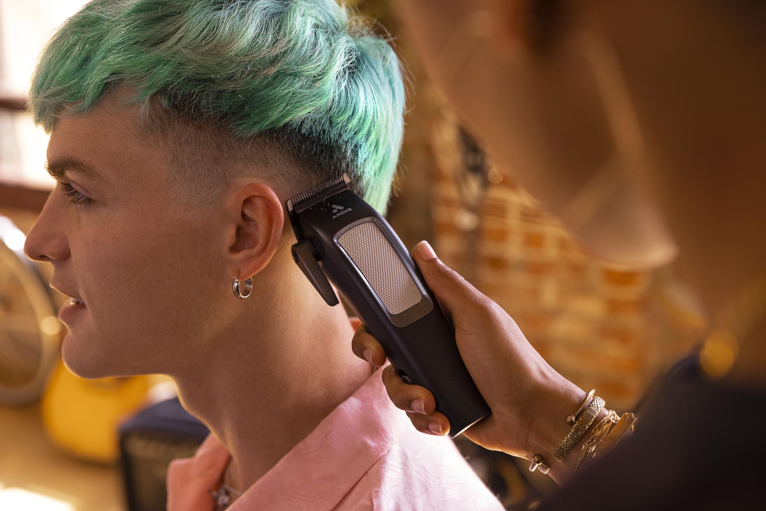 Close-up of the titanium-coated adjustable blade on the Andis cordless hair clipper