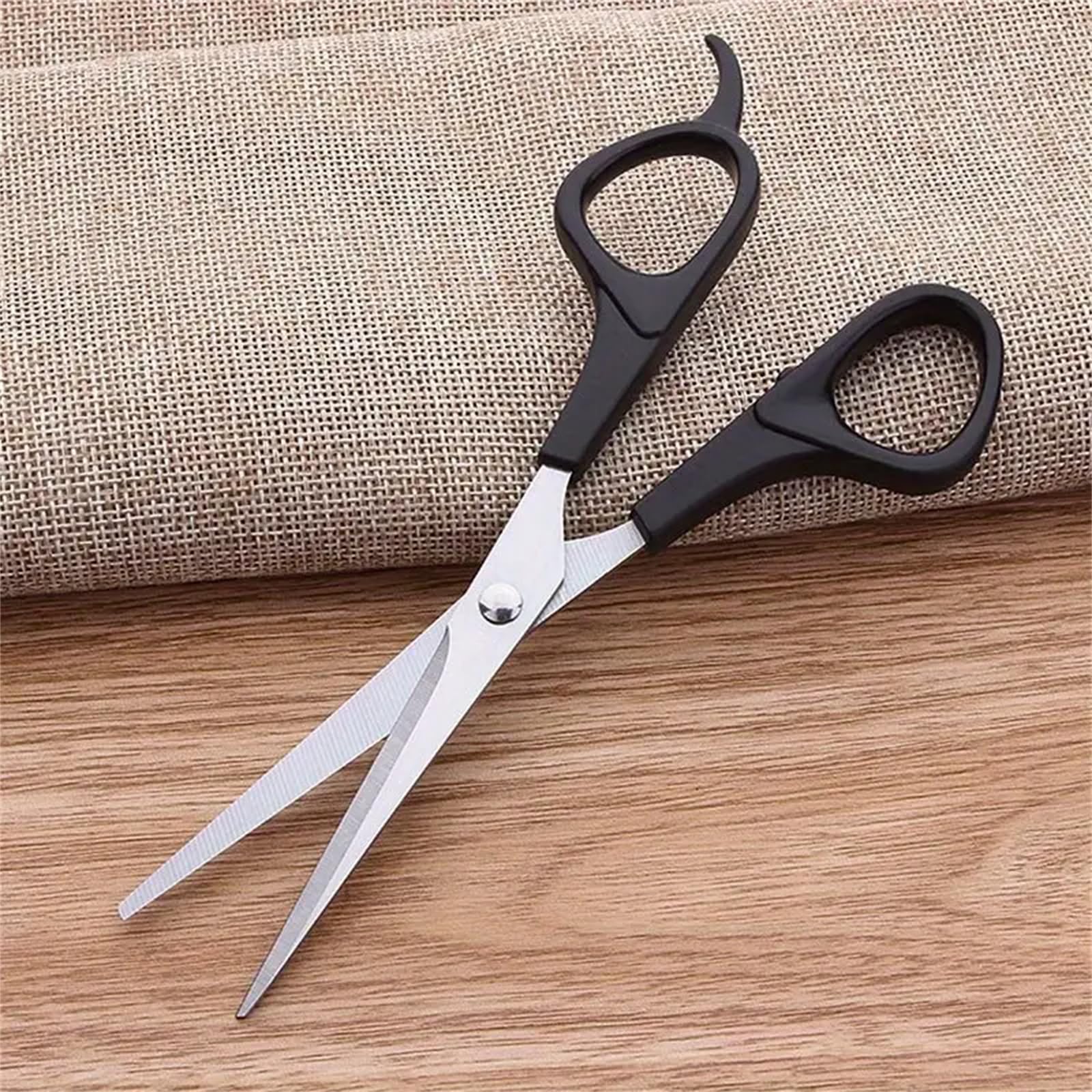 WOWITIS texturizing thinning scissors close up highlighting the premium teeth pattern for blending hair layers