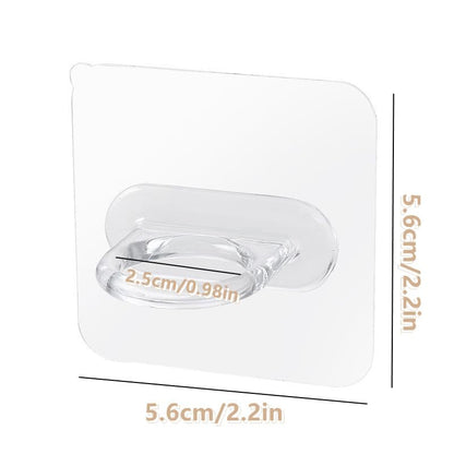 Throjin adhesive scissor storage mounts arranged in a neat row on a professional salon mirror