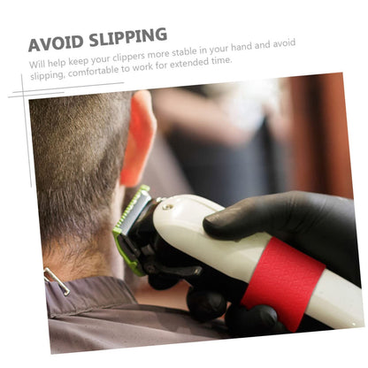 Ergonomic grip demonstration of the DECOMELODY silicone clipper band on an electric hair razor handle.