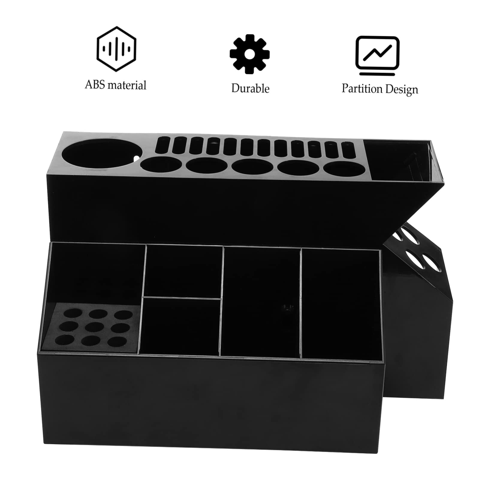 Sleek black desktop shear holder stand resting on a clean salon countertop
