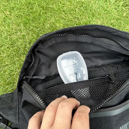 Universal travel safety razor container packed inside a travel pouch for luggage organization.