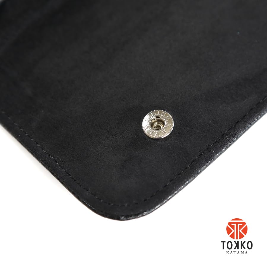 Tokko Katana five slot scissor organizer layout showcasing individual compartments for professional styling accessories.