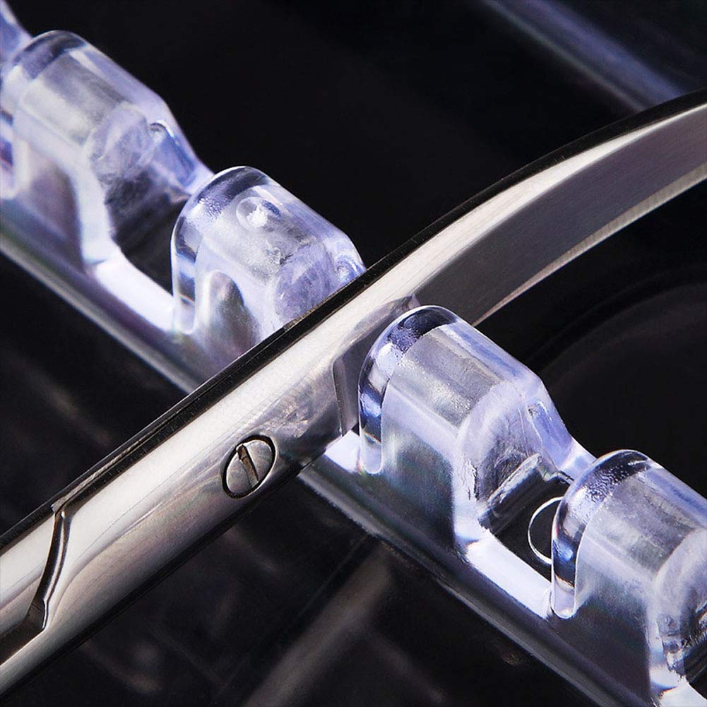 Mollensiuer clear plastic salon tool organizer close up focusing on the secure base suction cups on a counter