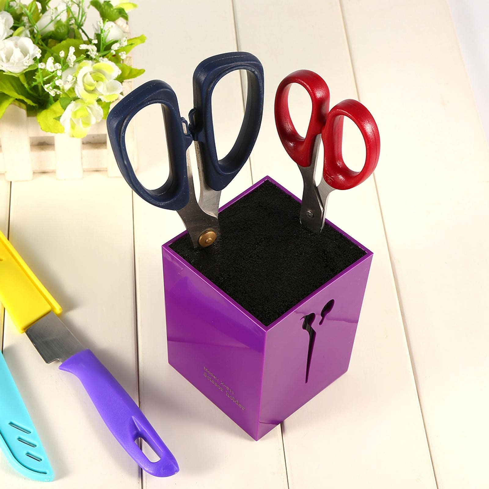Removable inner brush compartment detaching from the purple hairdressing shear organizer box