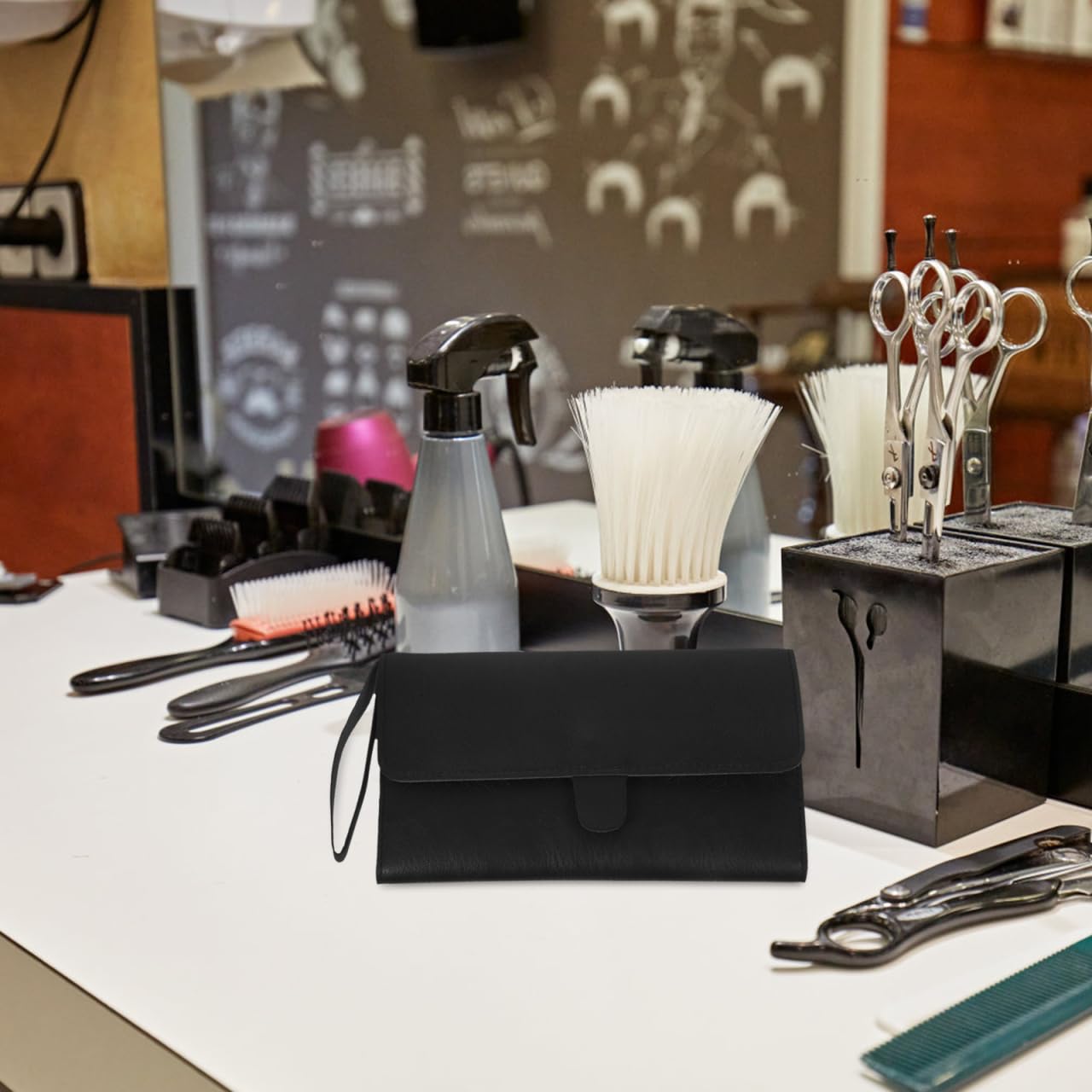 HONMEET leather hair tool case being held by a stylist to demonstrate travel portability.