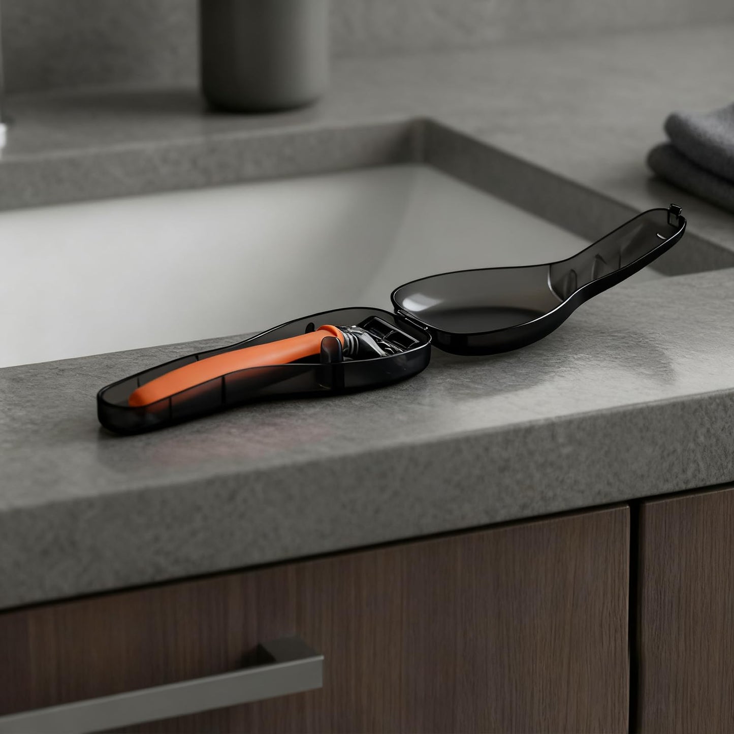 Transparent plastic shaver storage container opened to showcase the universal fit interior.