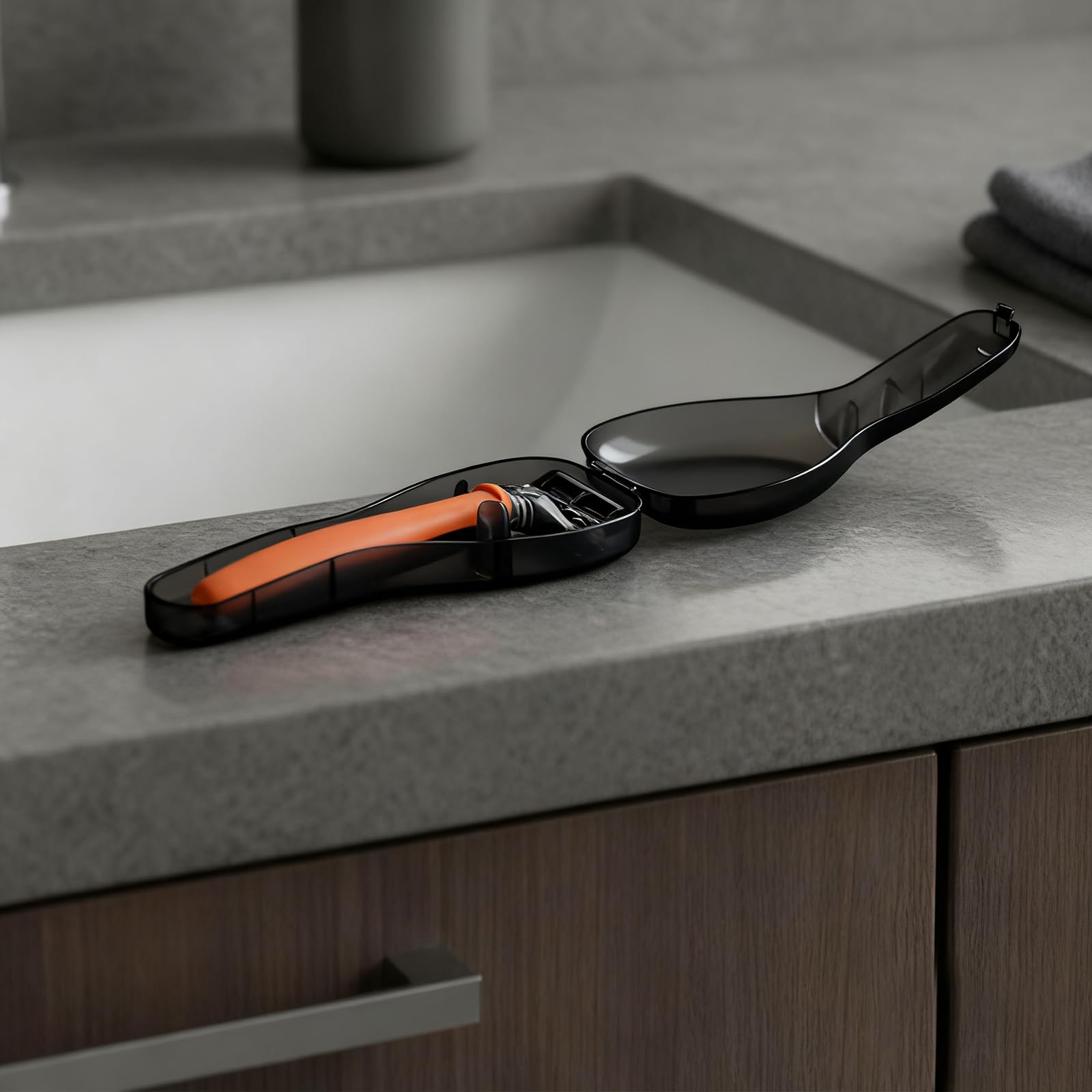 Transparent plastic shaver storage container opened to showcase the universal fit interior.