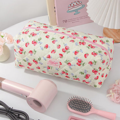 KCWVSIE floral travel organizer showing the large capacity interior layout suitable for multi-styler attachments.
