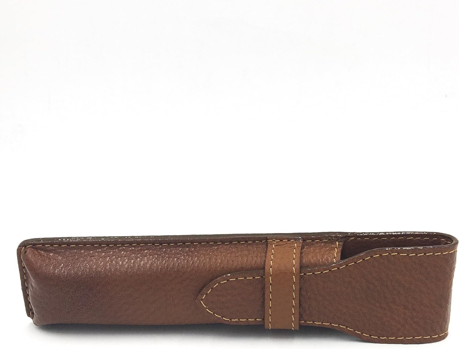 Compact leather barber razor protective pouch alongside a premium grooming setup.