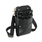 Professional hair stylist wearing Aolaso leather scissor holster on waist