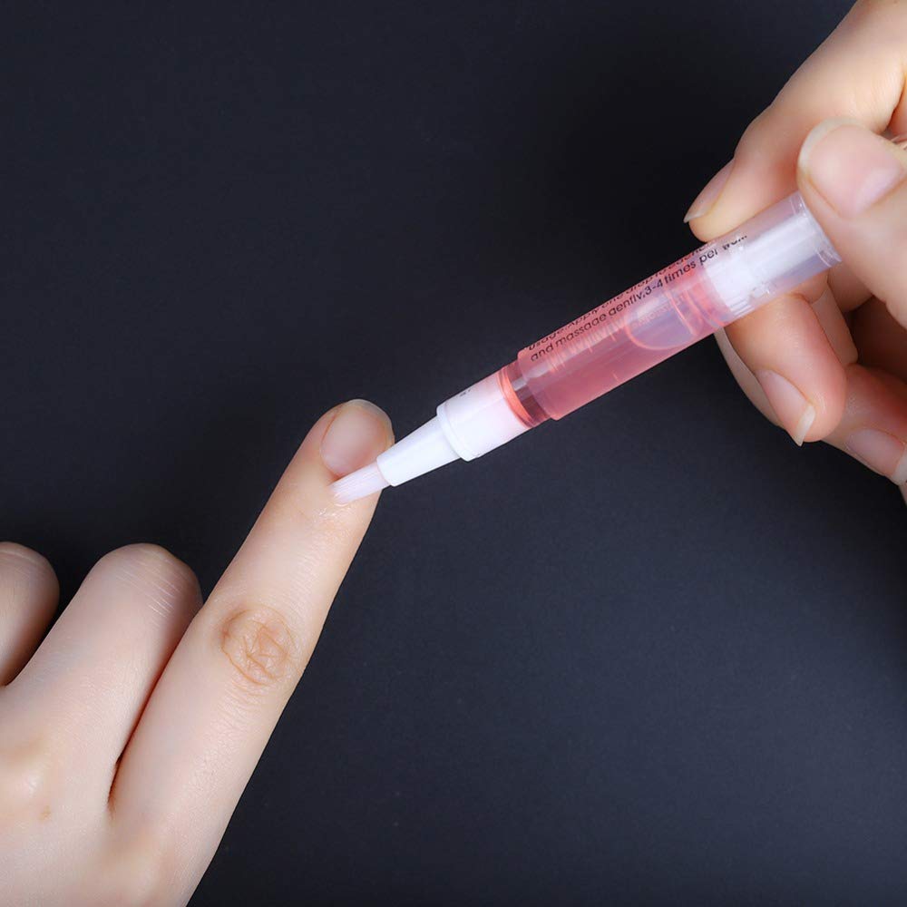 Using Miss Forever cuticle oil pen on dry finger cuticles