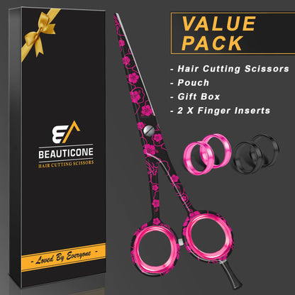 Ergonomic offset handle and adjustable pink finger inserts on the Beauticone lightweight hair cutting tool.