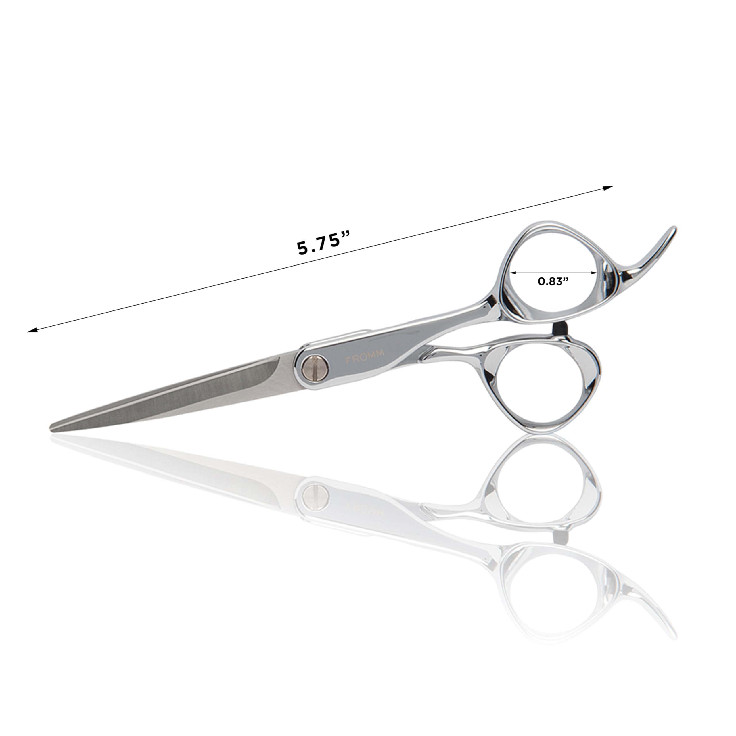 Detailed shot of the pivot screw and mirror finish silver coating on Fromm professional shears