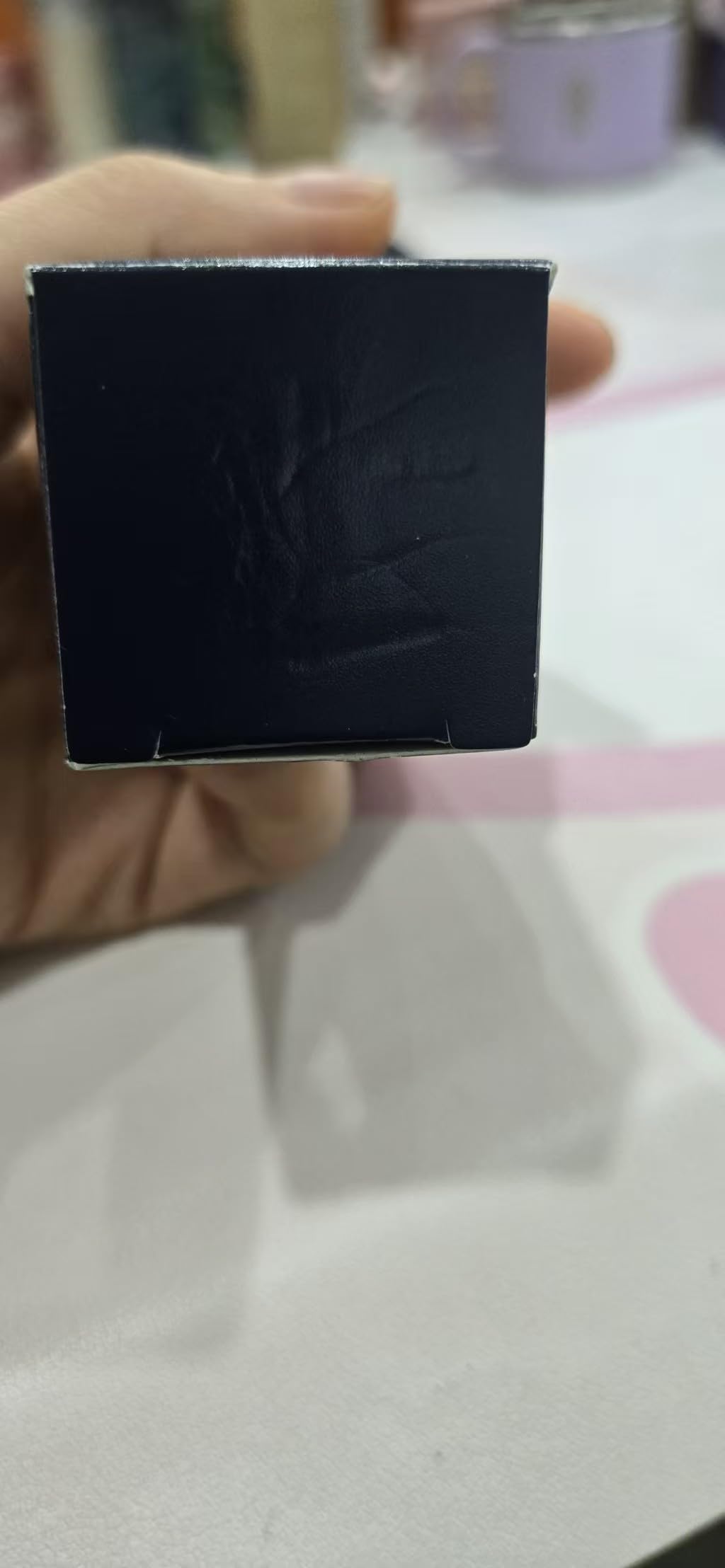 Close up of 16 milliliter nail treatment bottle with lavender and aloe vera