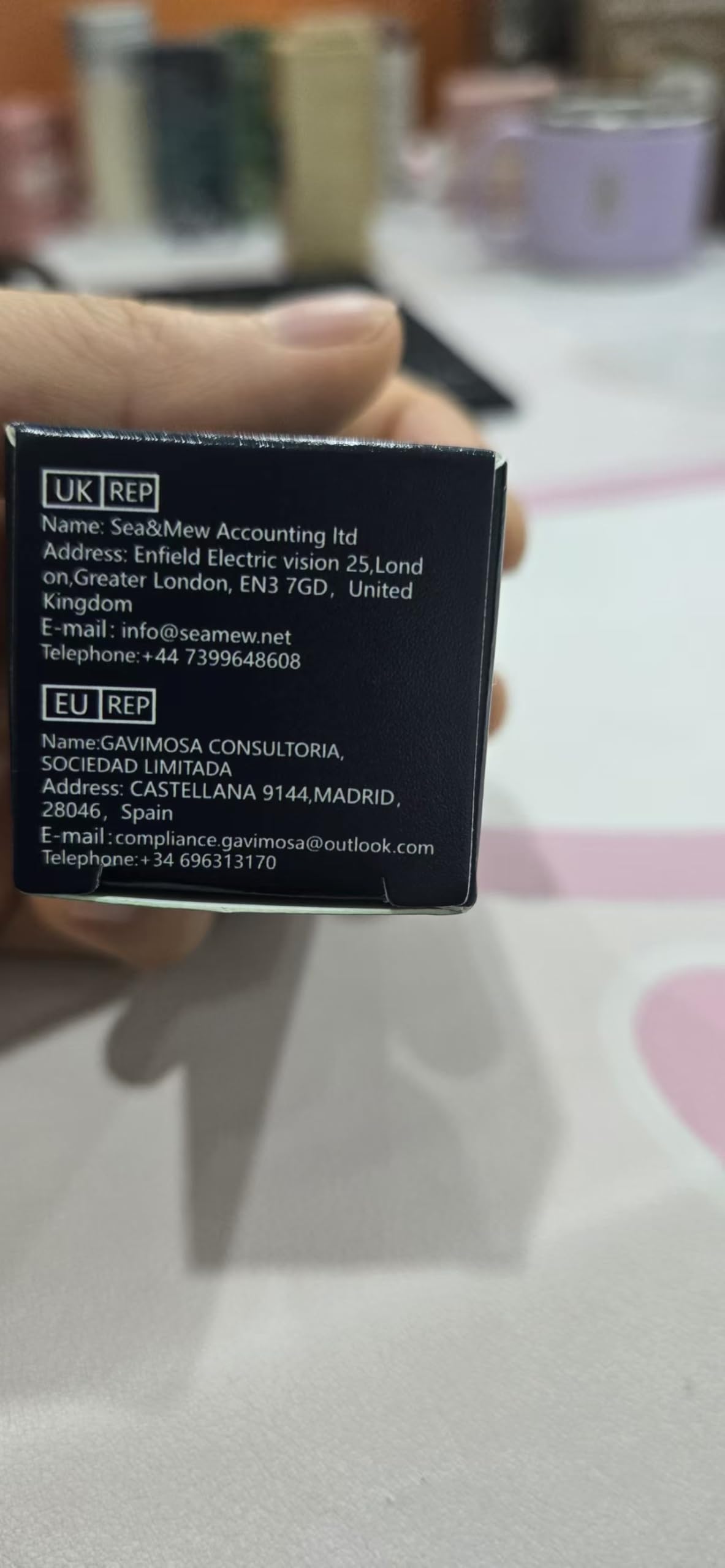 Applying nourishing nail and cuticle oil for dry hands