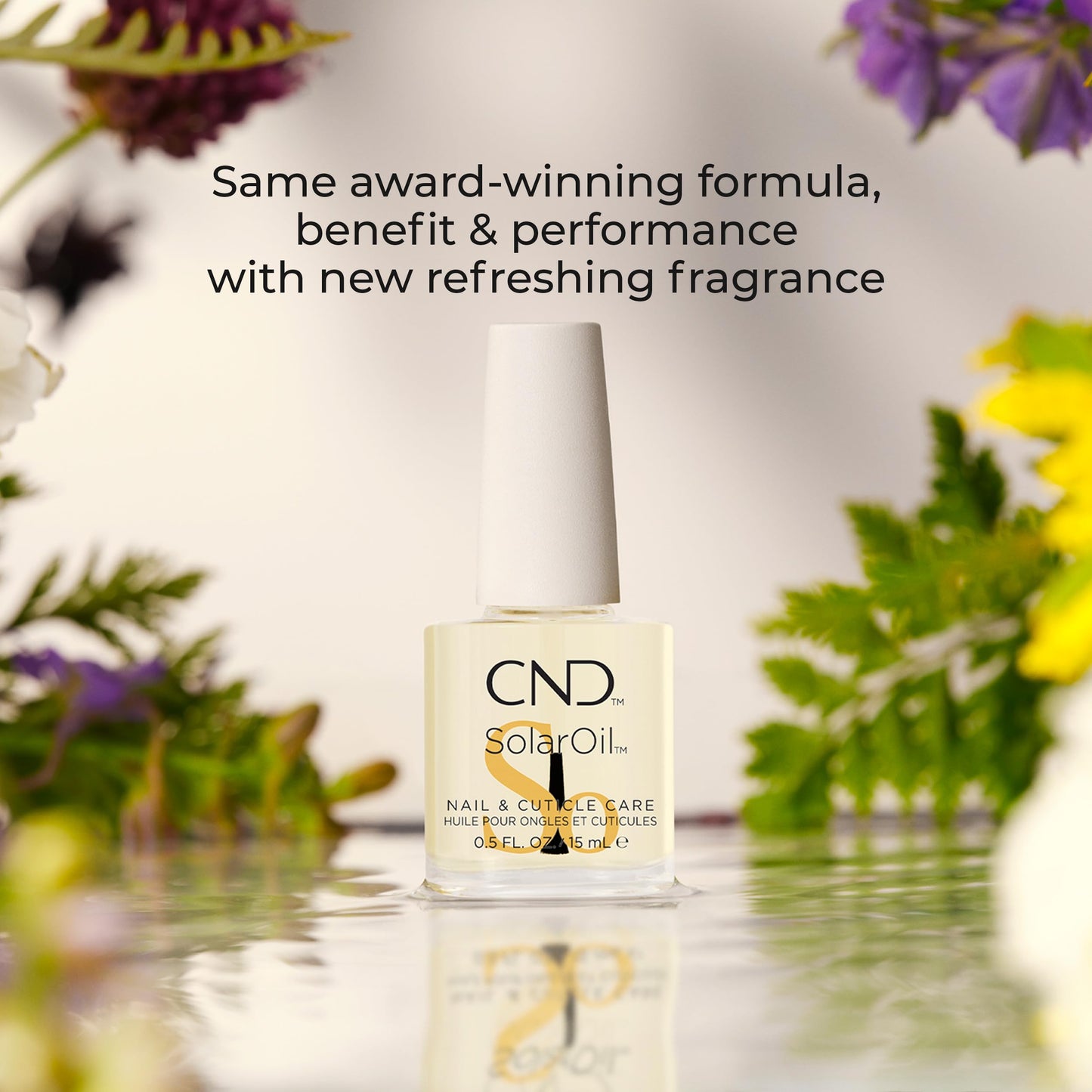 Application of Cnd SolarOil on fingernails