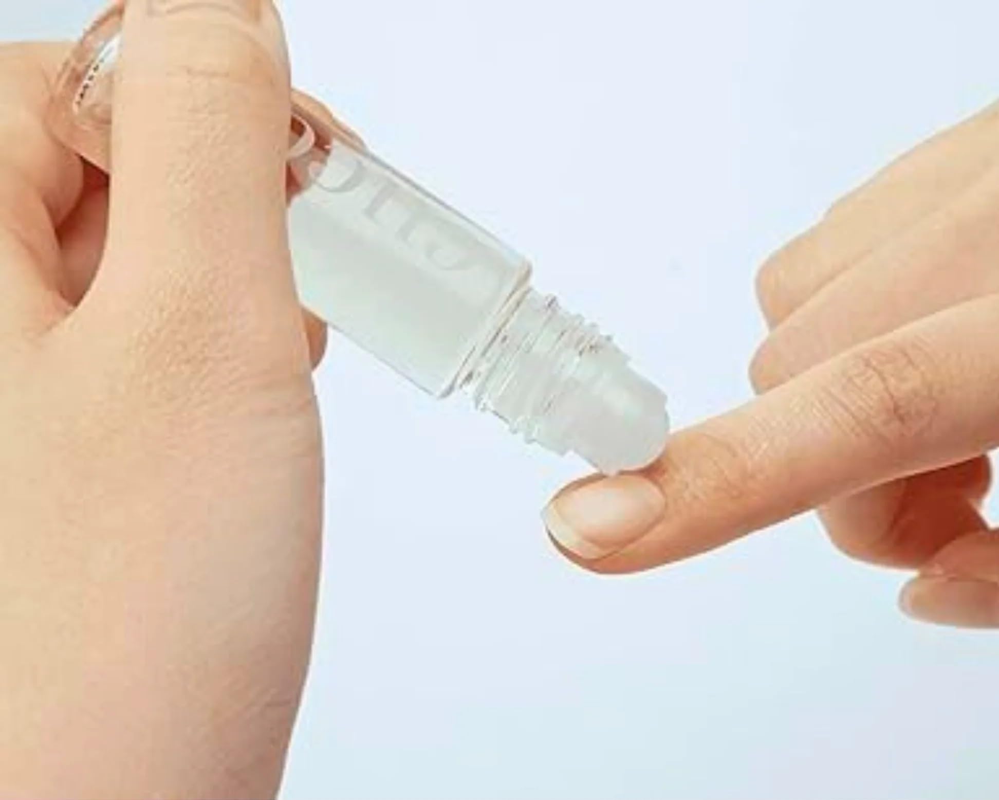 Close up of Cuccio cuticle oil rollerball applicator
