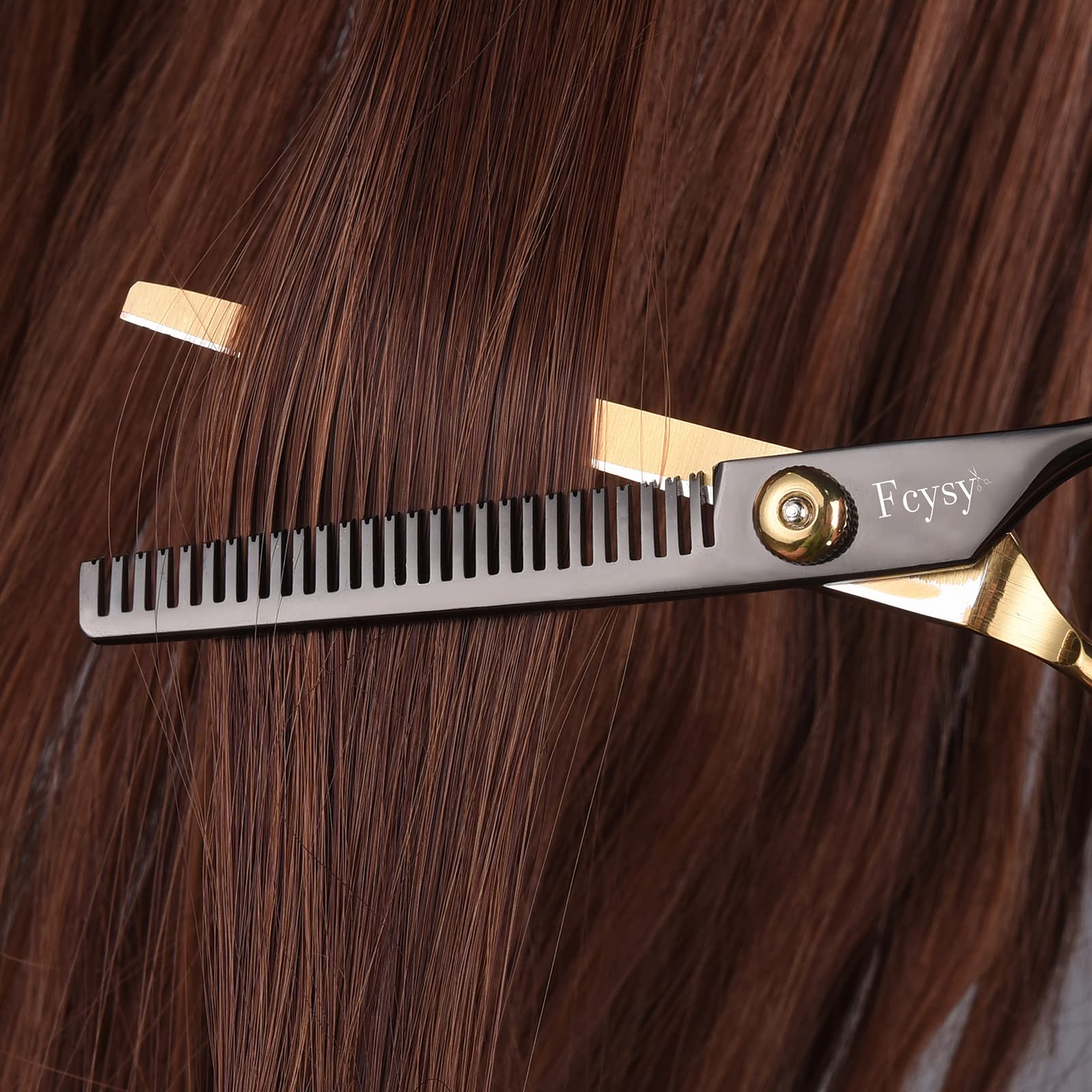 Ergonomic handle grip design of the Fcysy barber shears set for fatigue reduction.