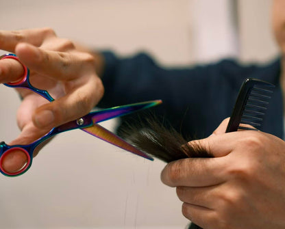 Vibrant aurora color rainbow finish on the 6.5 inch professional styling scissors.