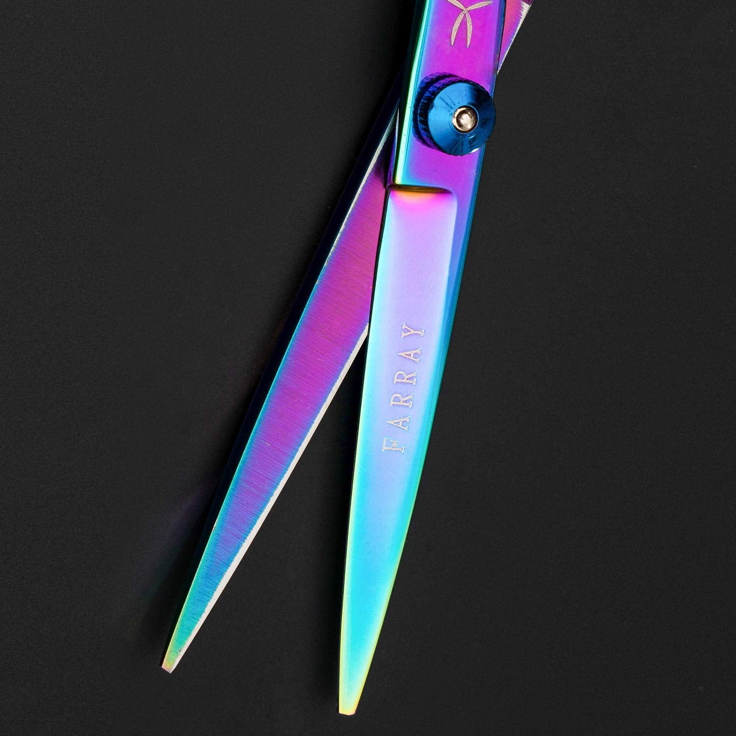 FARRAY razor edge shears demonstrating a comfortable finger rest grip.