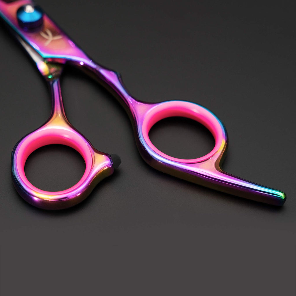 Removable rubber finger inserts inside the handles of the aurora hair scissors.