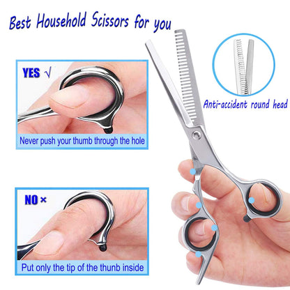 Essoy professional salon scissors being adjusted using the fine tension tuning screw feature.