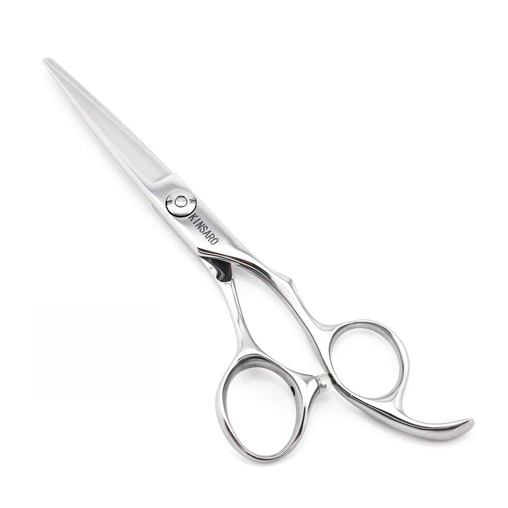 Detailed shot of the convex edge blade on Kinsaro barber shears for precise texturizing