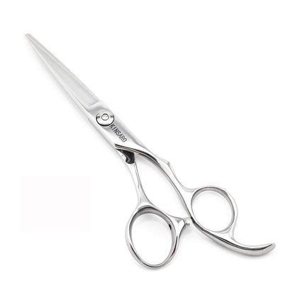 Detailed shot of the convex edge blade on Kinsaro barber shears for precise texturizing