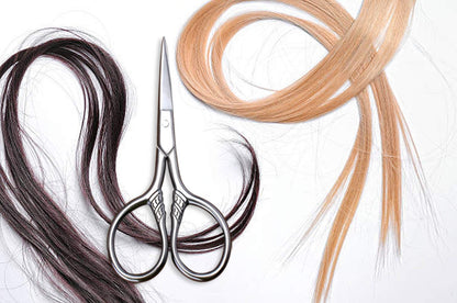 Premium stainless steel personal care scissors showing ergonomic finger loops