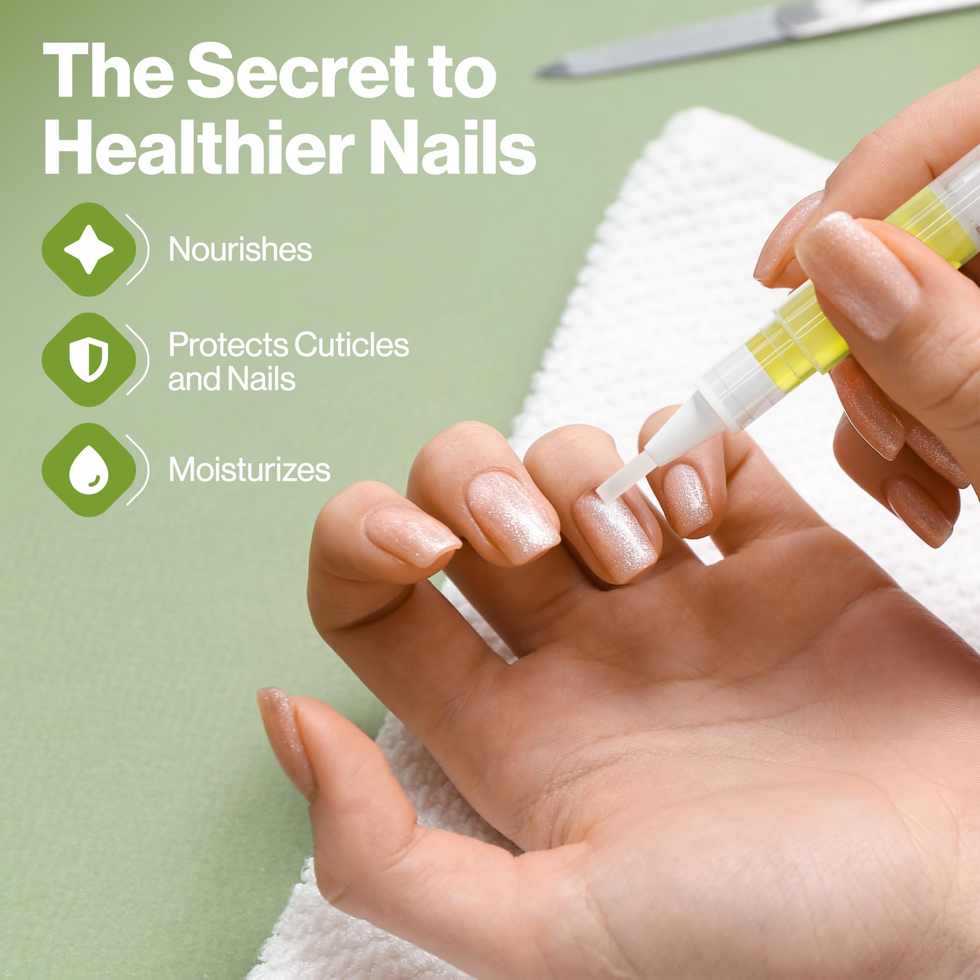 Applying Vitamin E cuticle oil to natural nails