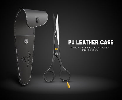 The Cut Factory 420 stainless steel scissors being used for a clean hair trim