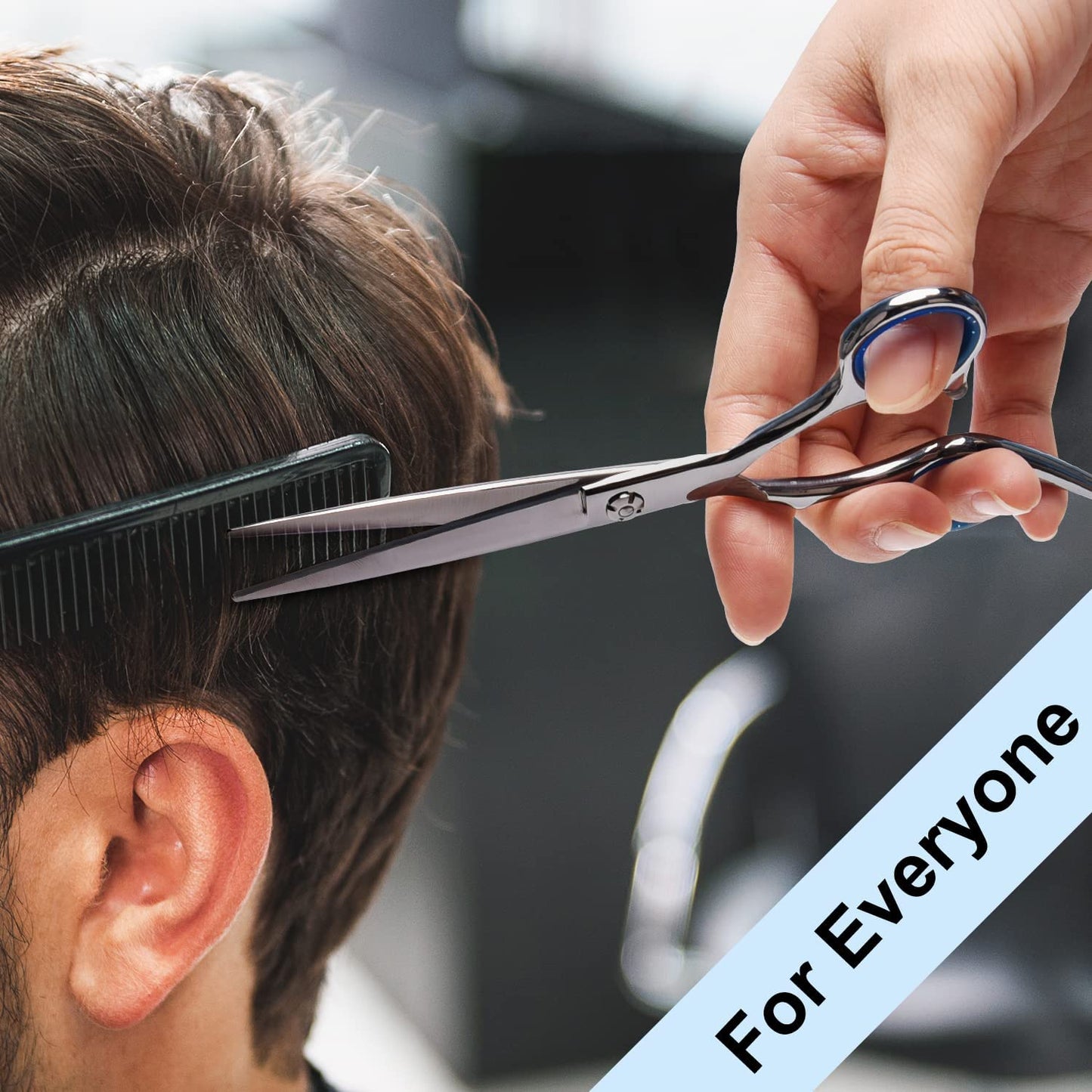 ULG professional hairdressing scissors held in hand demonstrating perfect ergonomic grip.