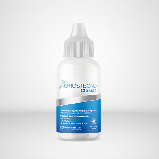 Ghostbond Classic lace wig glue bottle showcasing water resistant professional hair adhesive.