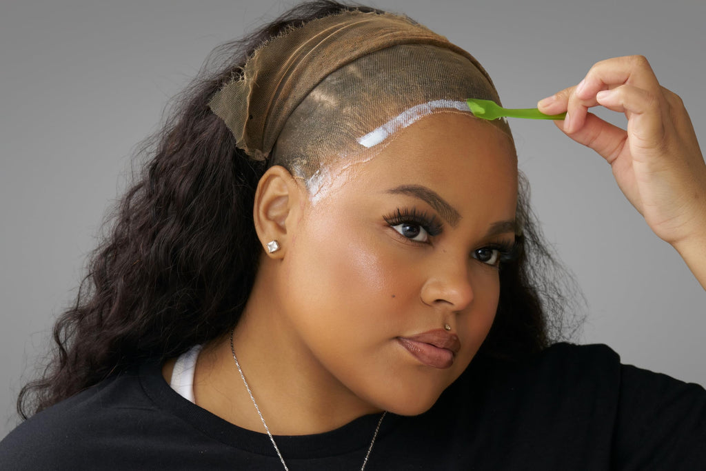 Ericka J Hold Me Down Adhesive Sport sixty gram bottle for professional hair styling