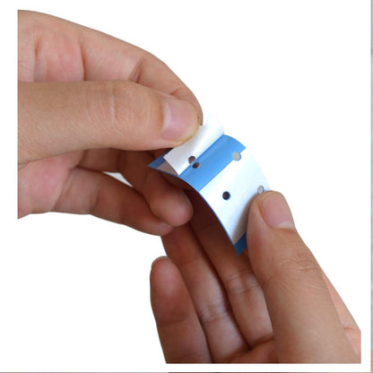 Close up of AIRAO double sided wig tape contour strip application side