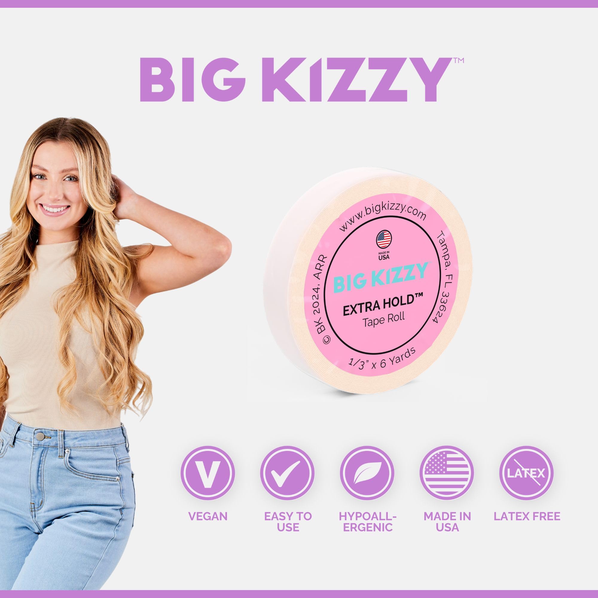 Side angle of Big Kizzy hair extension tape roll showcasing the zero point three one three inch width and pink backing paper.