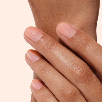 Hand model using Manucurist Active Glow polish for natural shine
