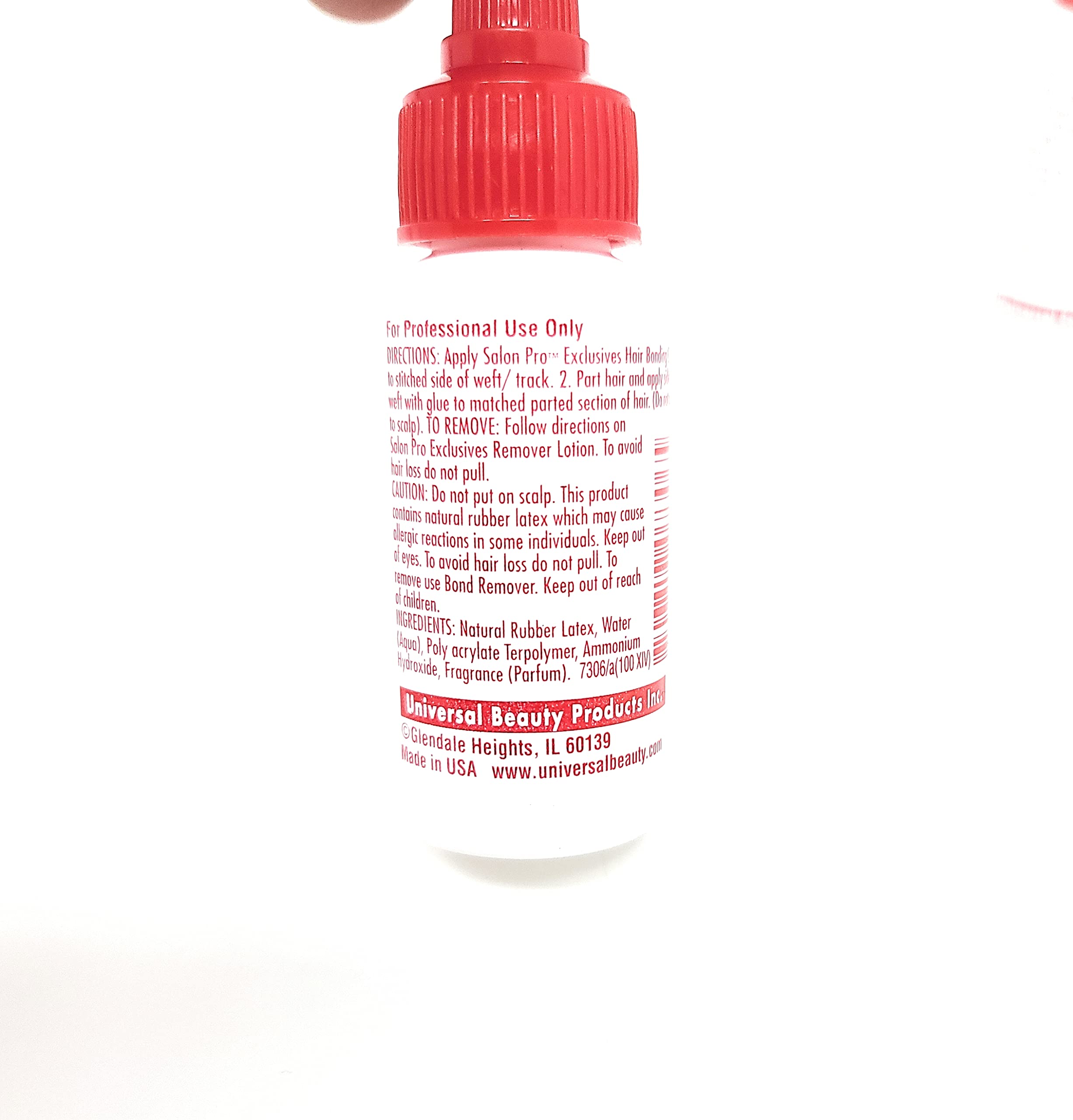 Three individual bottles of Salon Pro White extension adhesive shown standing upright side by side.