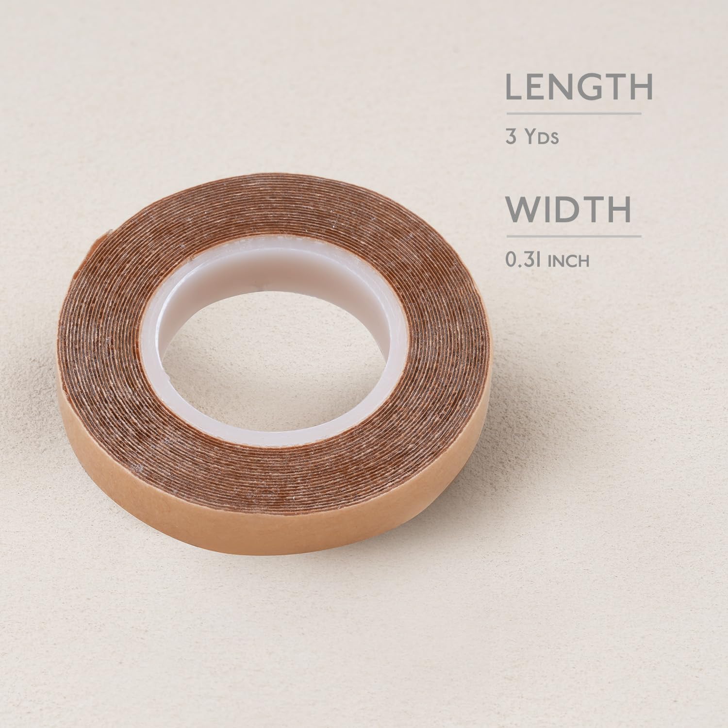 Close up view of WENNALIFE replacement tape roll being cut with scissors for hairpiece installation