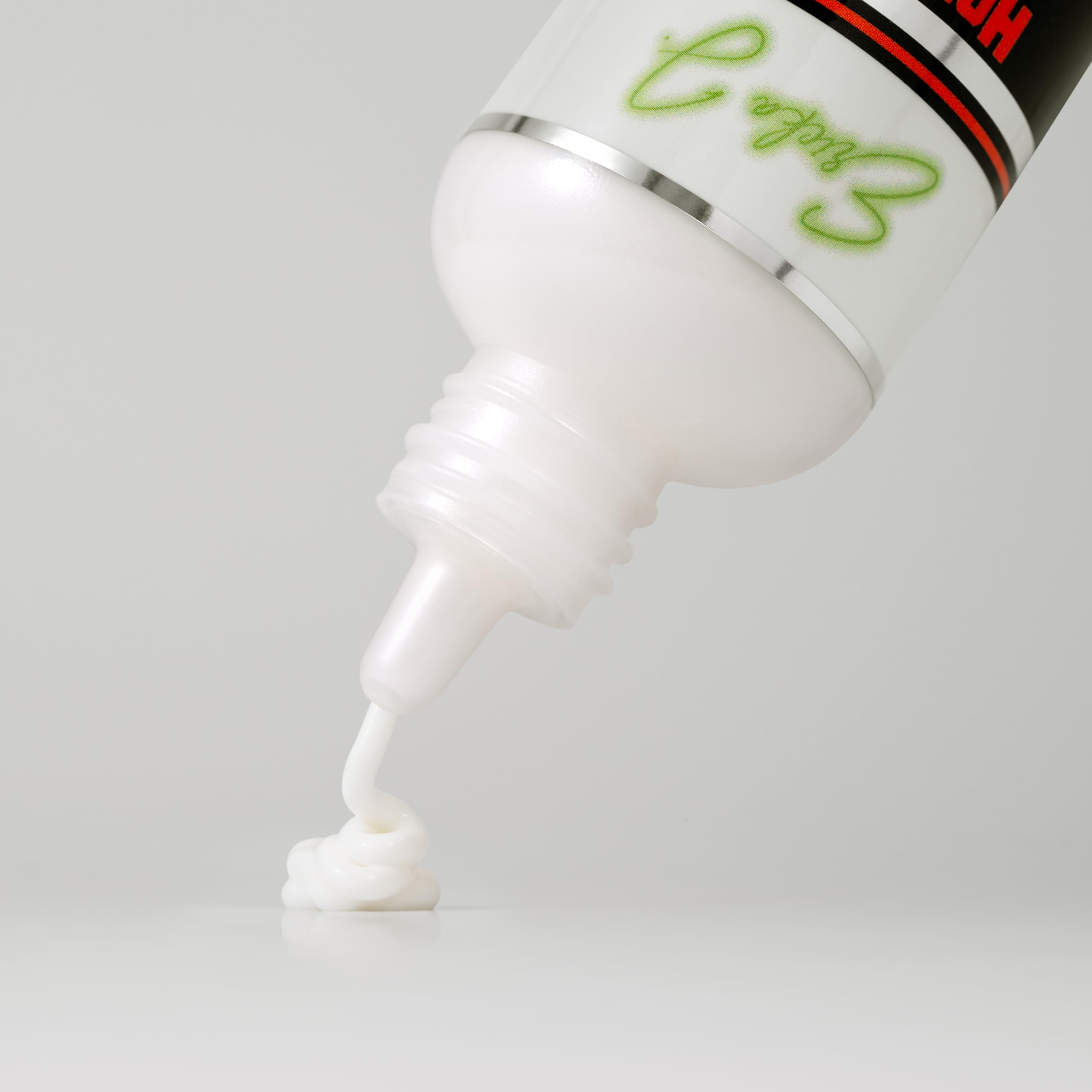 Ericka J Peach Flavored waterproof wig adhesive packaging showing product volume details.