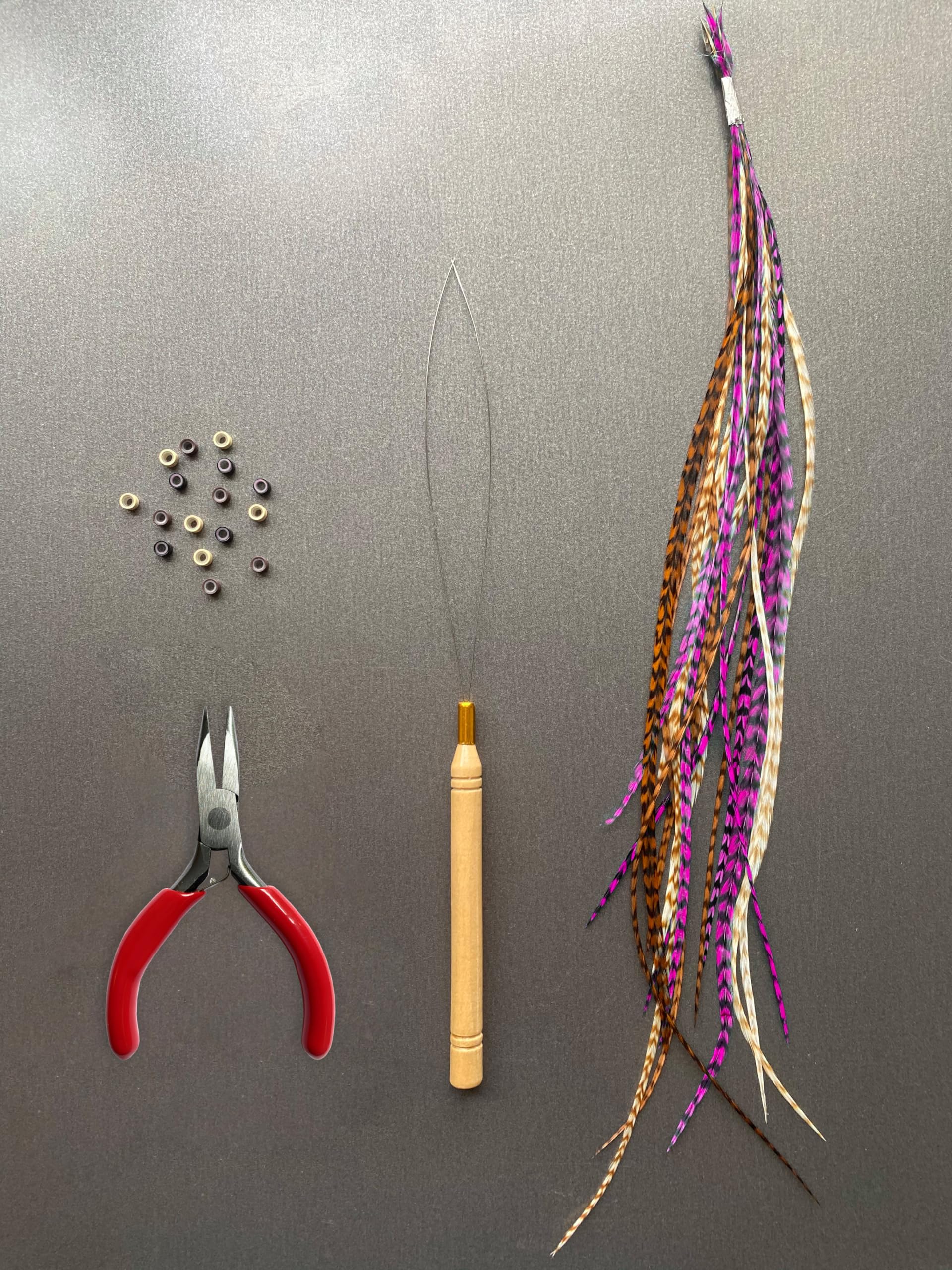 Model showing long rainbow feather hair extensions installed