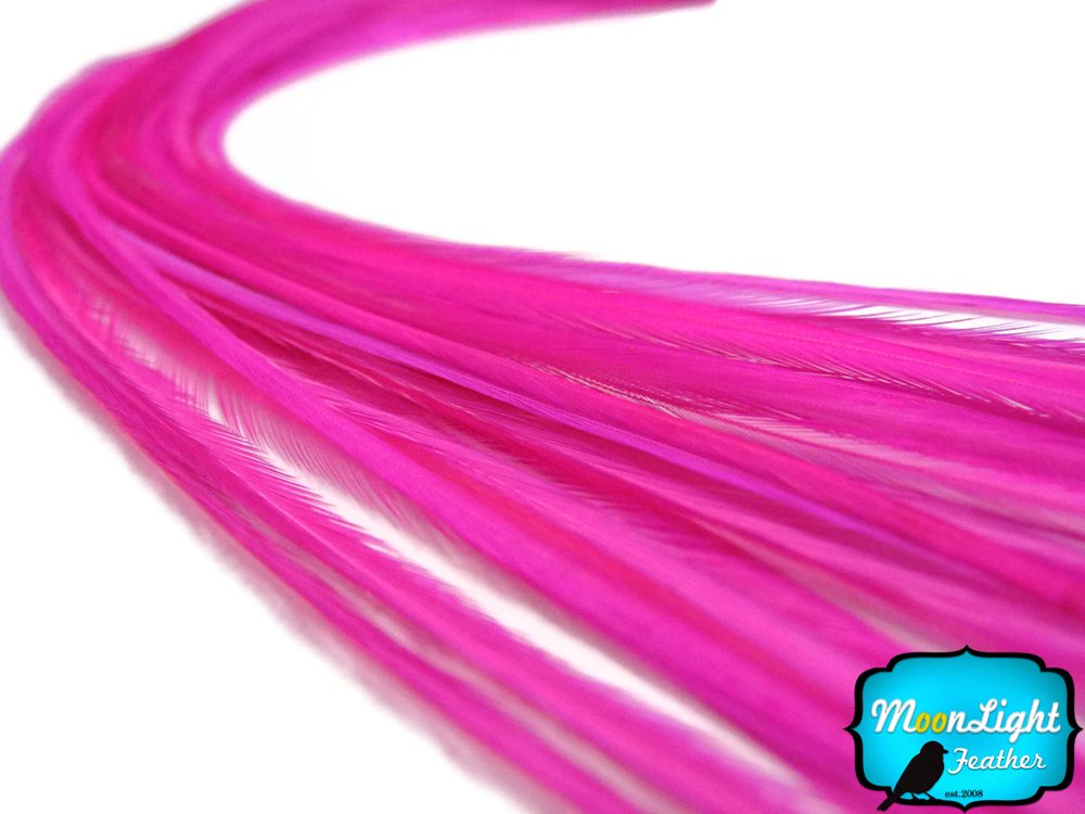 Ten piece set of authentic USA imported pink hair feathers
