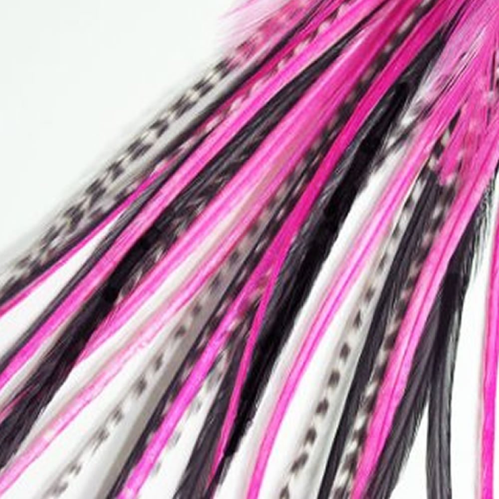 Close up of salon quality grizzly and pink feather hair extension tip