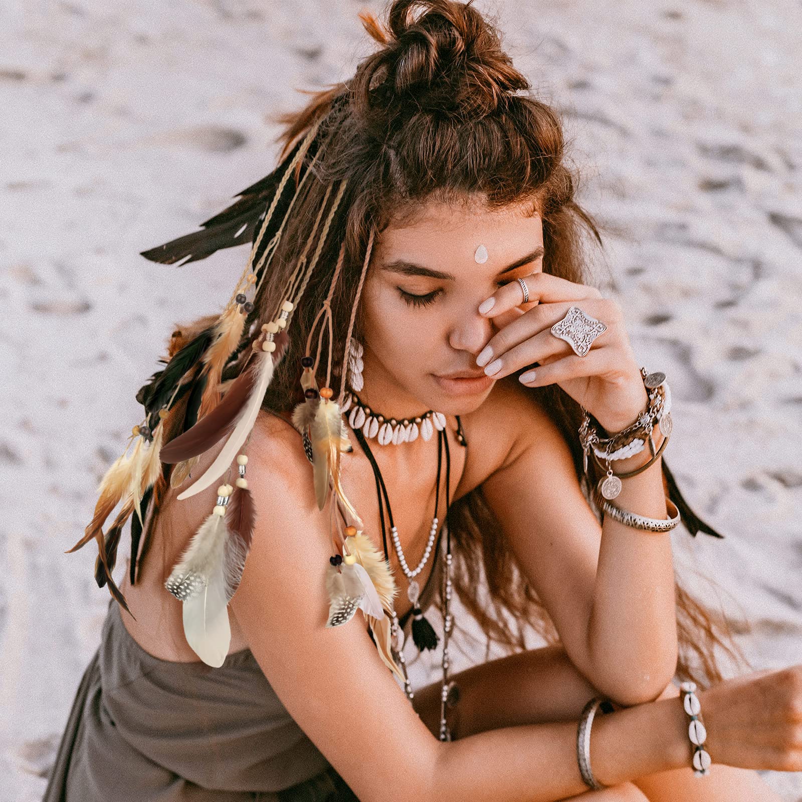Close up of Geyoga tribal feather clip with braided beads